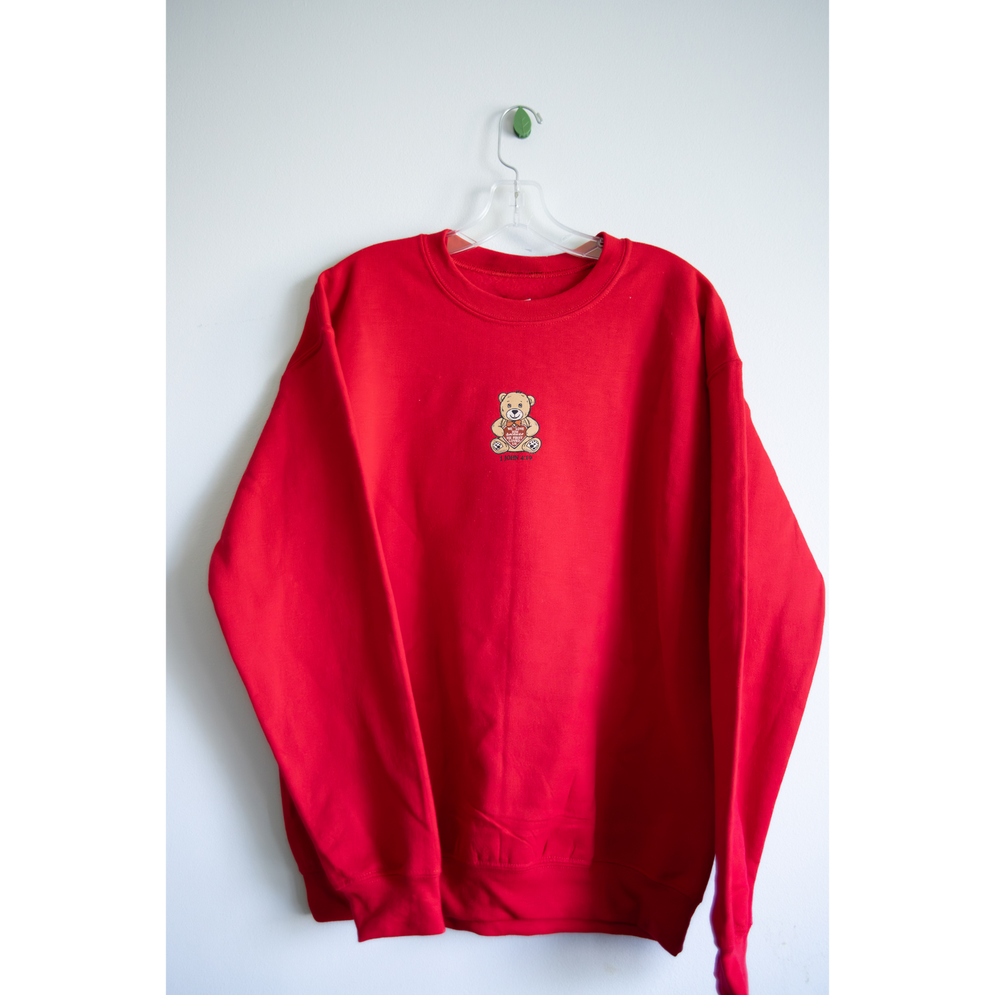 1 John 4:19 Crewneck